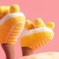Peluche Amuseables Soleil en rollers