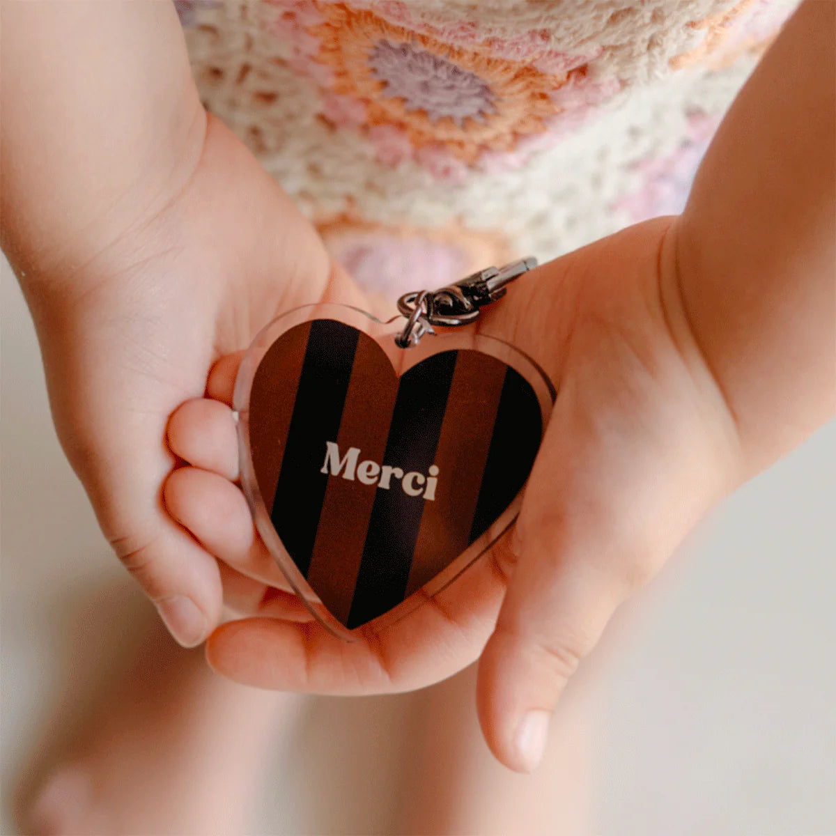 Porte-clés rayé "Merci"